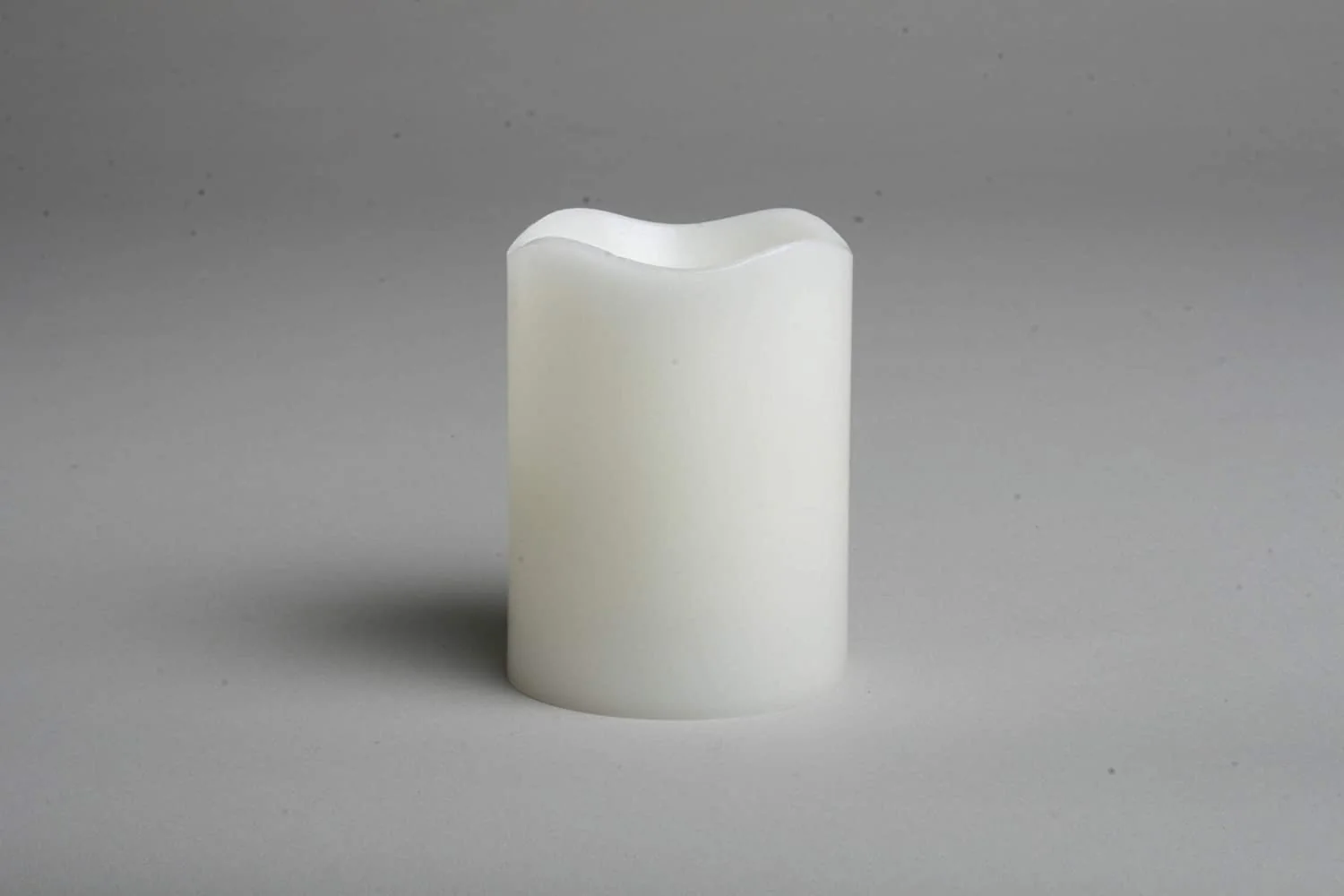 Wax Pillar Candle With Flickering LED Flame – Ivory – 4” x 3” - Image 2